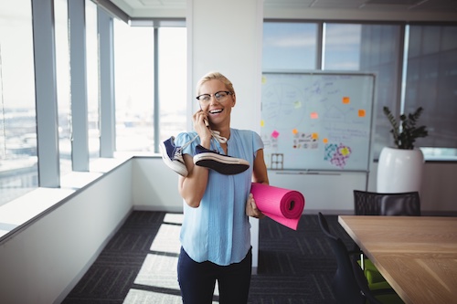 smiling executive workplace wellness