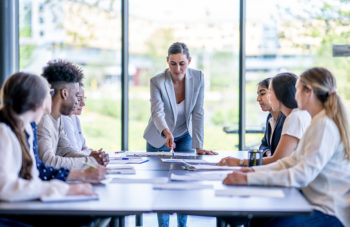 executive level team conducting meeting