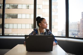 employee looking out the window