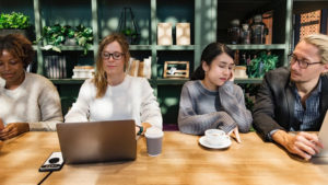 Reliable employees at desk